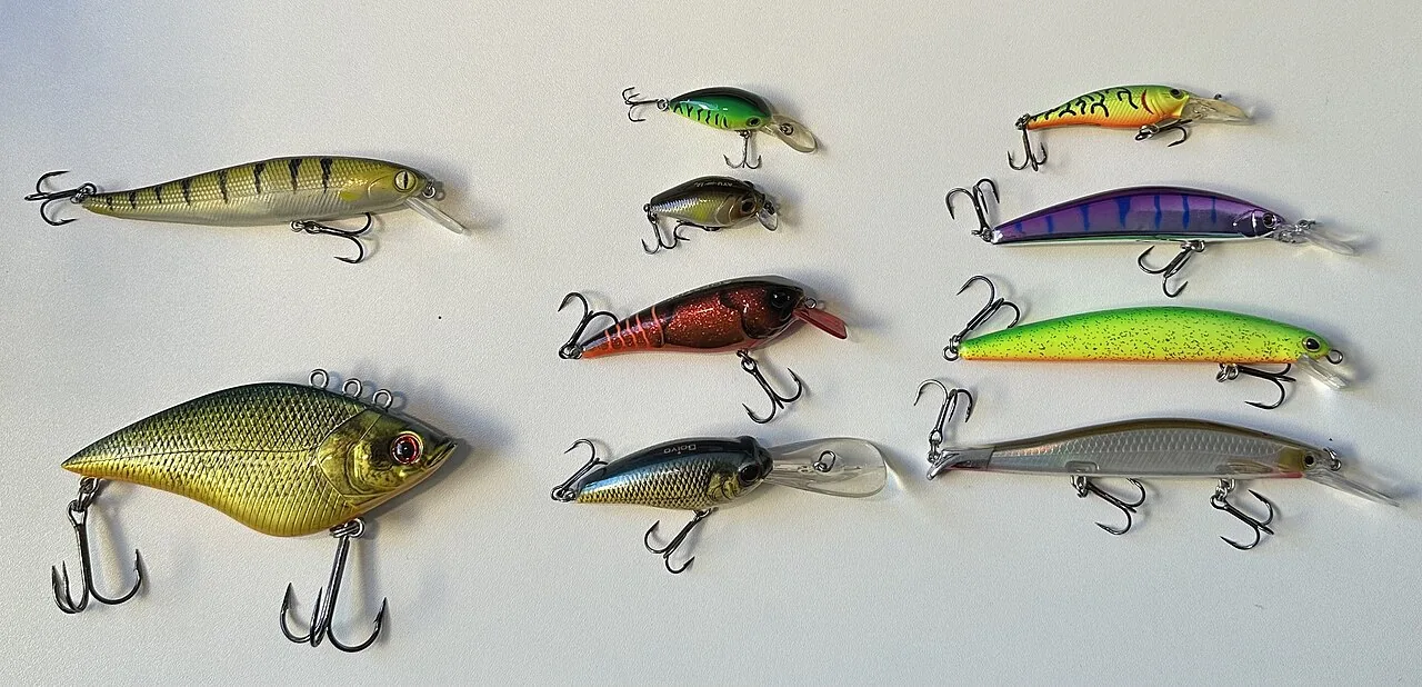 A suspending jerkbait beside cold autumn water